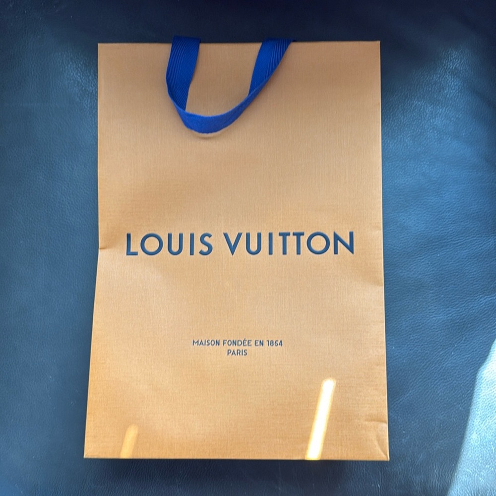 Authentic Louis Vuitton shopping bag